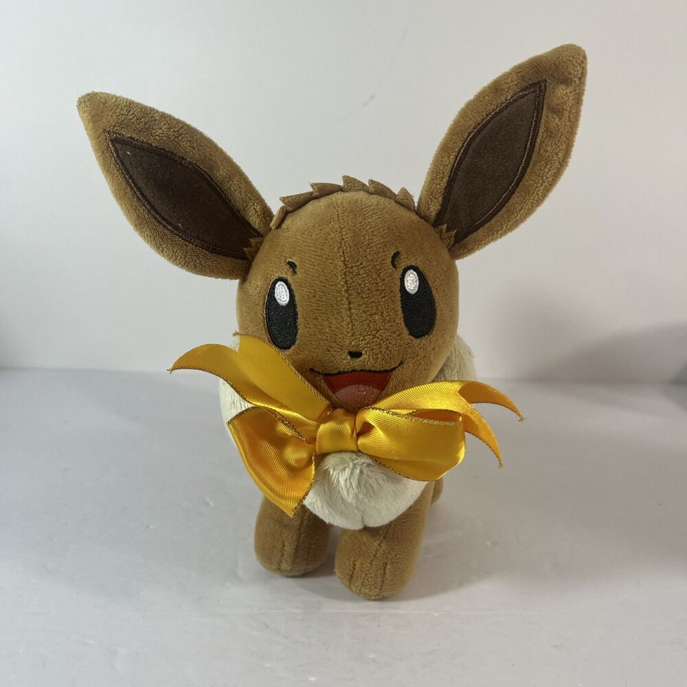 Pokémon Plush Eevee Brown Yellow Bow Winter Holiday Edition 9” 2021 Nintendo Toy